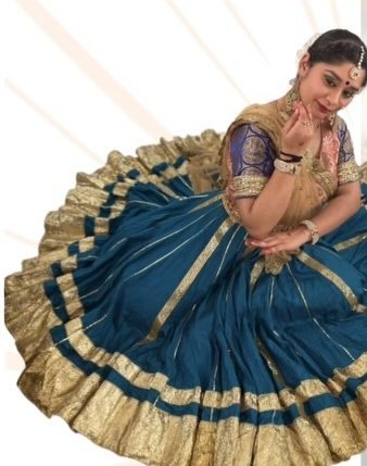 Paridhi Neema in a blue and gold Kathak costume