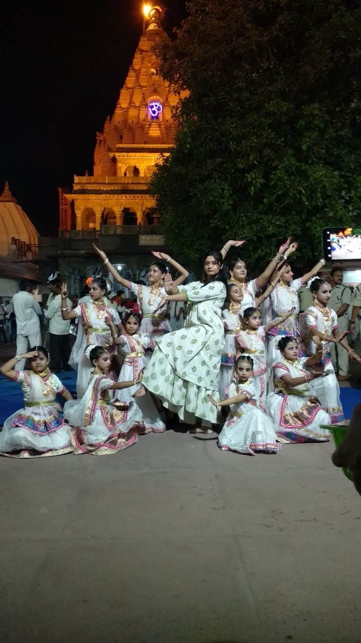 Divynaad students performing in front of a temple in Ujjain at night